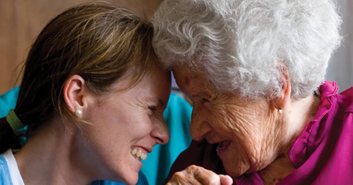 mother and daughter smiling